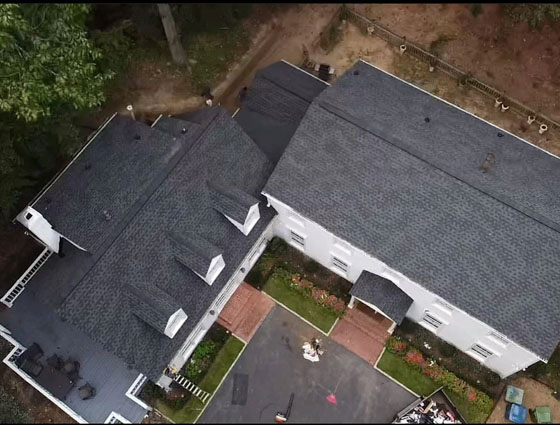 Aerial view of a residential roof repaired by D&R Contracting Solutions